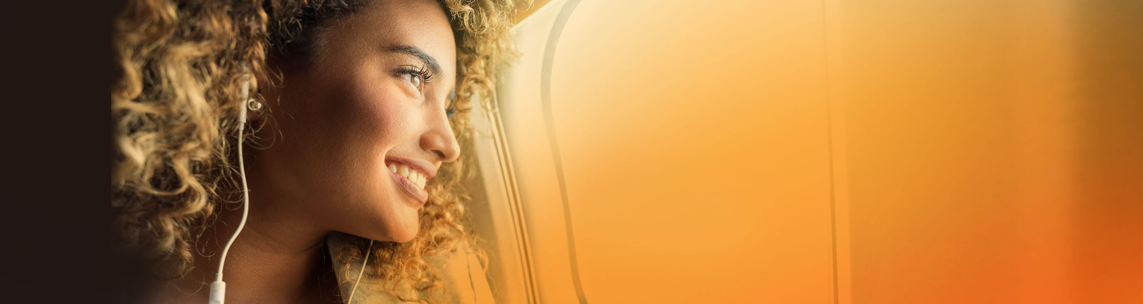 Woman looking toward the sunlight