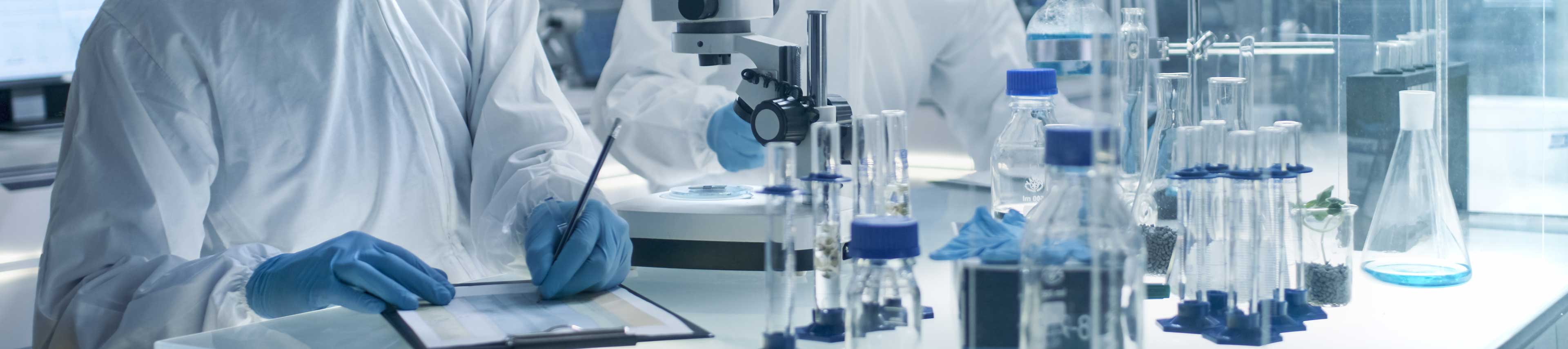 Laboratory glassware and a researcher